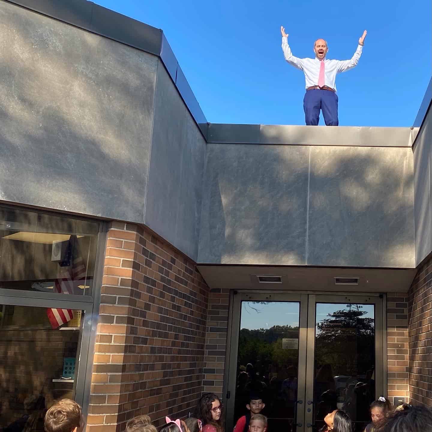 Principal Mitch Dubinsky on the roof of Briar Glen on first day of school